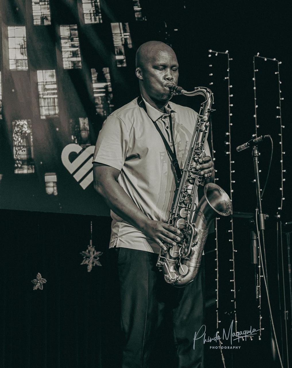 Black-and-white performance at the Heart Songs Music Academy stage